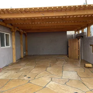 Removed old Pergola and replaced with new. Added a flagstone patio