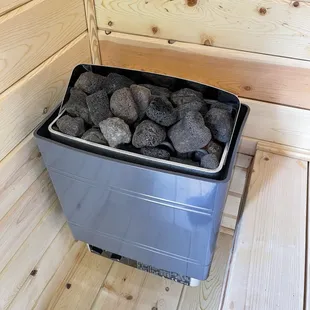 Hot coals in new sauna. Heats sauna up to 200 degrees! Getting the cubic feet and other variables just right to get optimal temps is key.