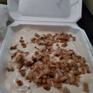 Biscuits &amp; Sausage Gravy.  Sausage gravy is not the way to go at this place.  Waited 20 minutes for this.  Not even sure if it&apos;s sausage.
