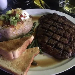 Wednesday steak dinner special $23, comes with ribeye, loaded baked potato, green beans, toast and salad  SO GOOD!!!!