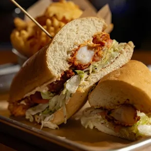Shrimp Po' Boy - Crispy Shrimp, Shredded Lettuce, Pickles, Tomato, New Orleans Remoulade