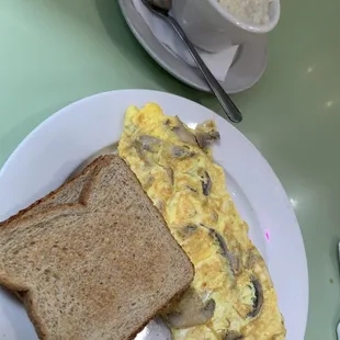 No frills omelet with grits n toast