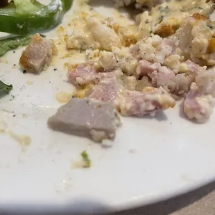 Loaded potato with spoiled ham.