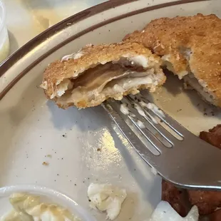 Can you see the sliver of dried out fishi the shell of breading
