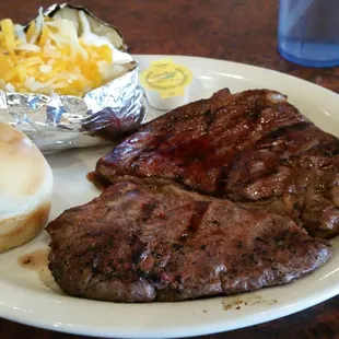 12 oz Sirloin with loaded baked potato.  Nice steak at a great price.