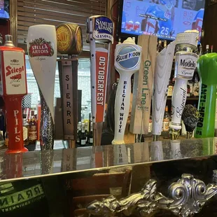 a row of beer taps