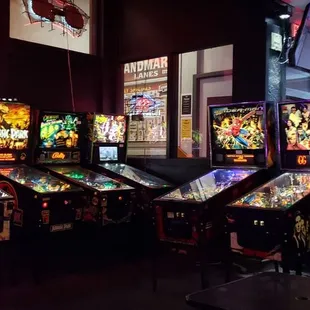 a row of pinball machines