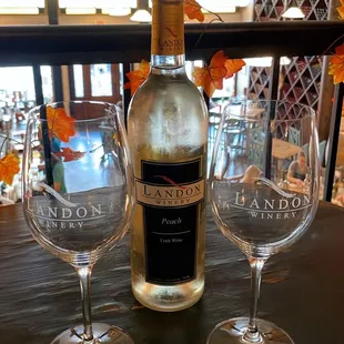 two wine glasses and a bottle