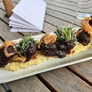 Vegetarian BBQ meatballs and grits