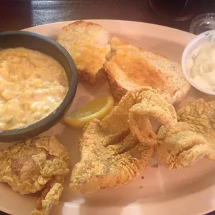 Crawfish au gratin, two fried fish and one stuffed shrimp.