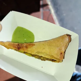 a person holding a plate of food