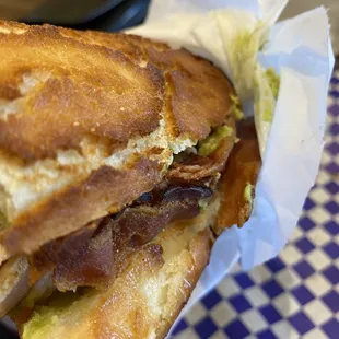 a sandwich with bacon and lettuce