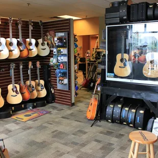 More acoustic guitars.