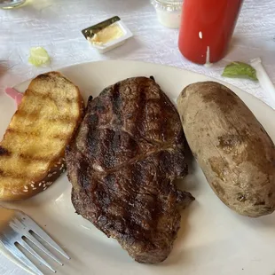 Ribeye, bake potato, and Texas toast