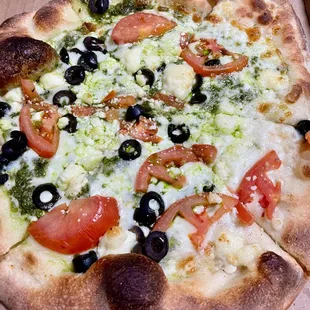 Green Stingray add Feta. Pesto (no red sauce), black olives, &amp; fresh tomatoes + feta. THE BEST PIZZA EVER.