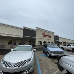 cars parked in front of the store