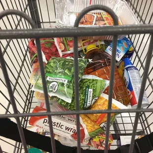 a shopping cart full of food