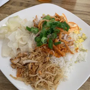 #11  Sliced pork with marinated egg over broken rice.