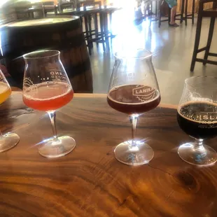 Testing this place out and I would definitely say my favorite is the Alaula (Cherry Ale - 3rd in the pic).
