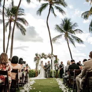 Outdoor wedding ceremony at Lanikuhonua Cultural Institute - Wedding Photography by HNL Studios www.hnlstudios.com