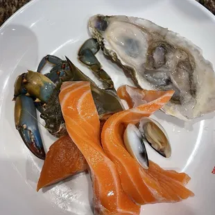 Crab, oyster, and salmon. Eat 10 oysters and you'll get your money's worth.