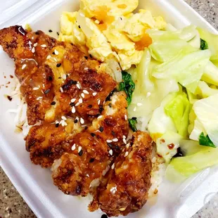 a meal in a styrofoam container