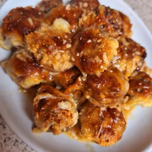 Stuffed Mushrooms : Pork Stuffed mushrooms (does include minced vegggies) seared to seal then topped with cheese and baked to perfection.