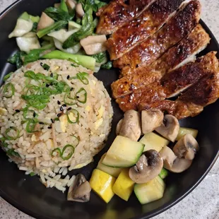 Pork Chop Meal : Marinated grilled chops paired with 2 sides and rice.