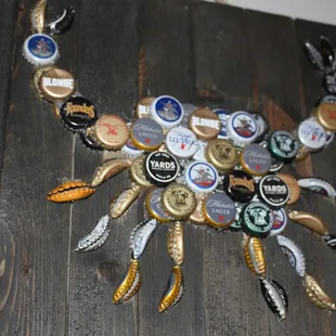 a crab made of beer caps