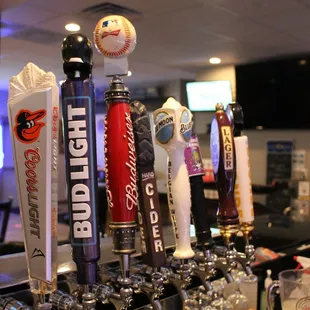 a row of beer taps