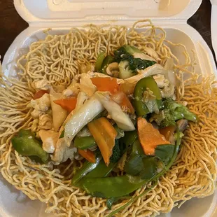 Crispy egg noodles with sautéed veggies and chicken