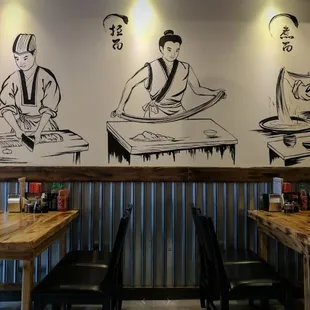 a wall mural of a restaurant