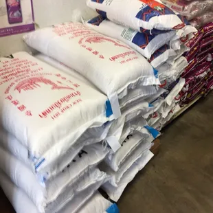 a stack of bags of rice