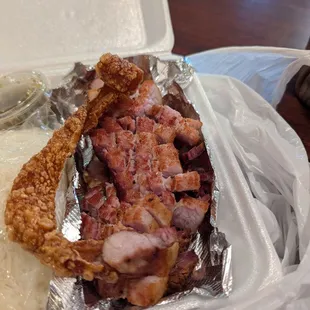 Crispy pork belly with rice.