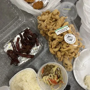 Lao Style Fried Chicken, Beef Jerky, Lao Style Papaya Salad &amp; Sticky Rice.