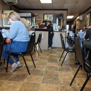 a woman sitting at a table