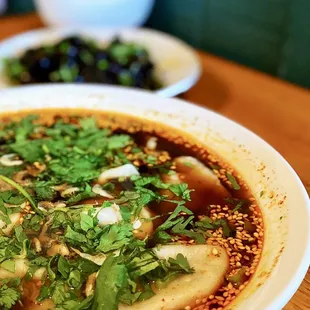 Beef and green onion dumpling soup