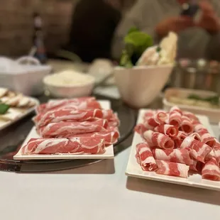 a variety of meats on a table