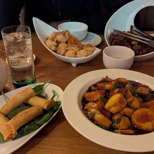 Vegetarian spring rolls, tofu with basil, lemon shrimp with walnuts and diced lamb