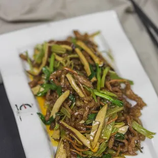 a plate of stir fried vegetables