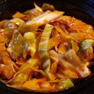 House special spicy cabbage ($6 for the smaller size), vegan by default. Tasty.