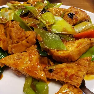 Tofu  home style ($17), vegan by default. Savory and tasty.