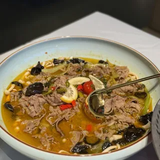 Sliced Beef Tenderloin In Golden Soup