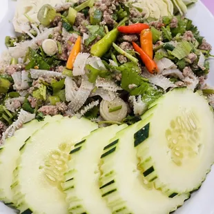 a plate of vegetables and noodles