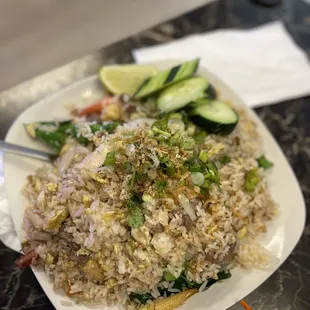 a plate of rice and vegetables