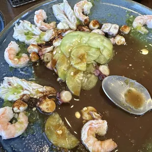 I did the aguachiles mixto green with the black sauce on the side. Soooooo good