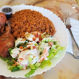 Jollof rice with fried chicken.