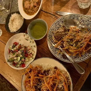 Qabuli palow (bottom), morgh qorma (top)