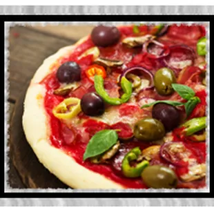 a pizza with olives and peppers