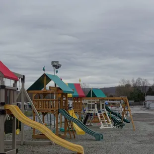 a playground with slides and swings
